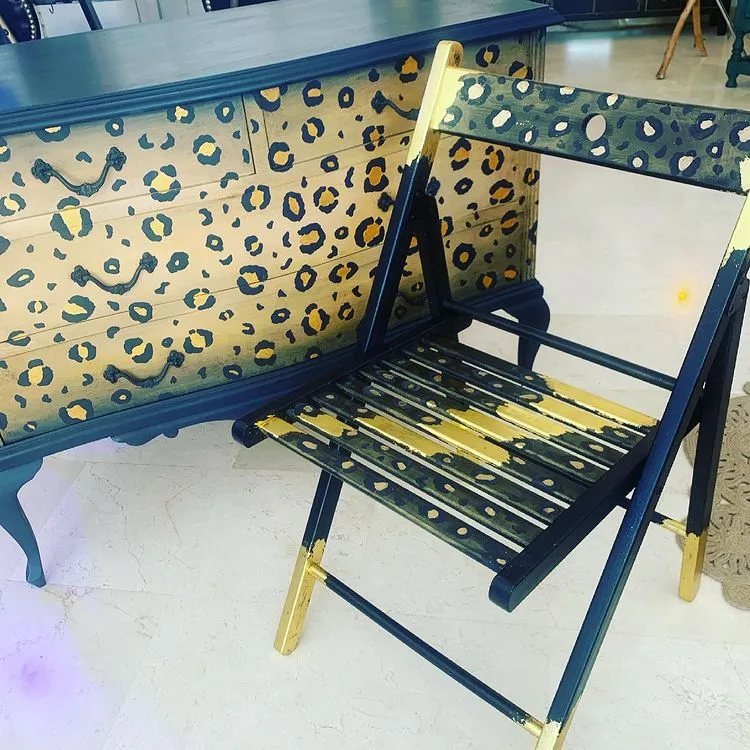 Outdoor garden table painted in weather-resistant green